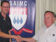 Bruce (r) being thanked by branch chairman John Owen-Ellis after the presentation
